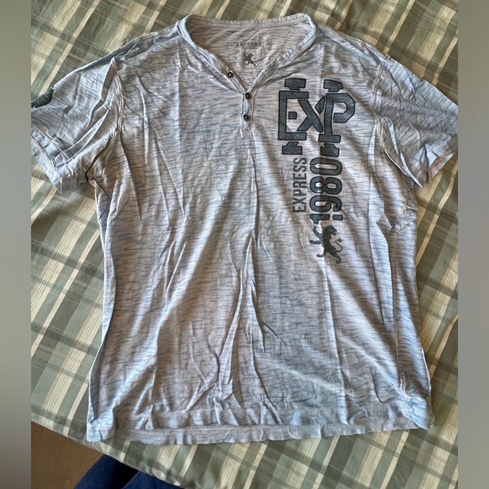 Men’s express tshirt. Size xxl but shrunk so it fits like and xl